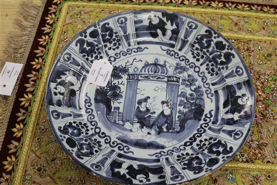 Two Delft blue and white dishes, late 17th century, 34 and 36cm, faults
